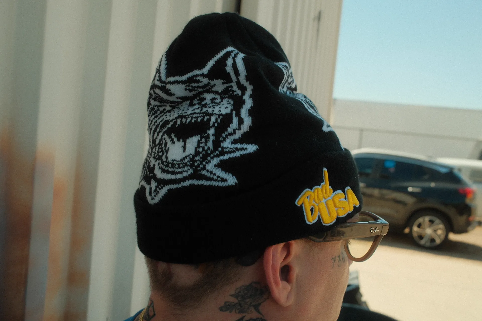 Inside the Colorblox Merch custom apparel production shop in Gilbert, AZ — screen printing presses and embroidery machines