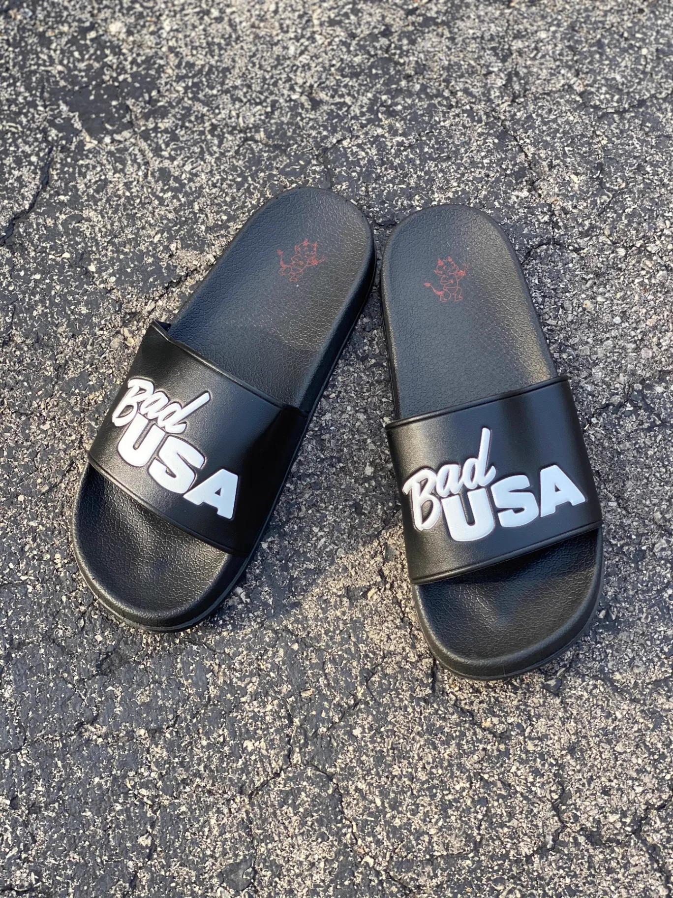 Custom Logo Embossed Slides for @badusa by Colorblox Merch in Gilbert AZ